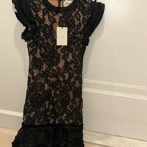 Alexis black lace mini dress with ruffle